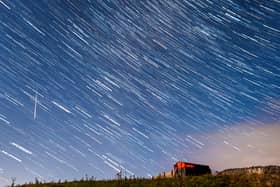 A meteor and star trails during the Perseid meteor shower seen from near Hawes in the Yorkshire Dales National Park