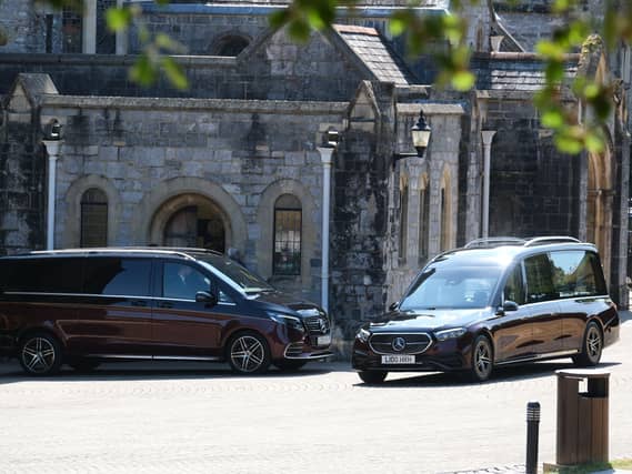 A hearse on a road
