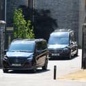 A hearse arrives at Buckfast Abbey in Buckfastleigh, Devon