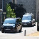 A hearse arrives at Buckfast Abbey in Buckfastleigh, Devon