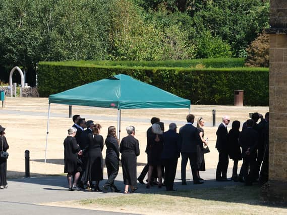 Mourners arriving for the funeral of former Tory minister Ann Widdecombe at Buckfast Abbey