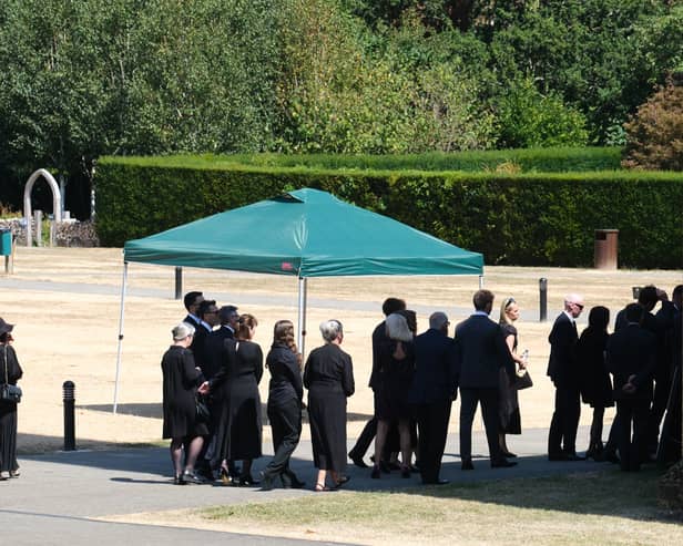 Mourners arriving for the funeral of former Tory minister Ann Widdecombe at Buckfast Abbey