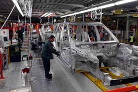 Range Rovers in production at the Jaguar Land Rover (JLR) plant Solihull (David Jones/Archive/PA)
