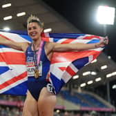 Amy Hunt celebrates her 200m gold medal with the Union Jack while wearing a jewelled tiara