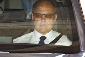 Glyn Razzell in the front seat of a car
