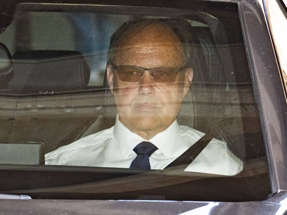 Glyn Razzell in the front seat of a car