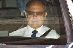 Glyn Razzell in the front seat of a car