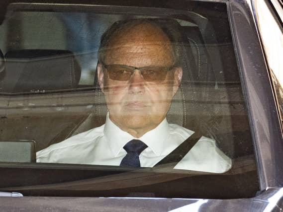Glyn Razzell in the front seat of a car
