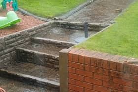 Water Flowing Down Malcolm Podmore'S Garden During One Of The Flooding Incidents