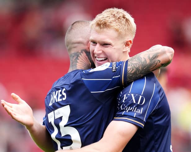 Josh Coburn (right) and Lyndon Dykes celebrate