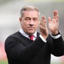 Scott Lindsey applauds the fans