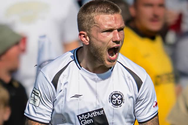 Jamie Cooke celebrates