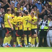 Watford’s Amin Nabizada (centre, facing) celebrates scoring
