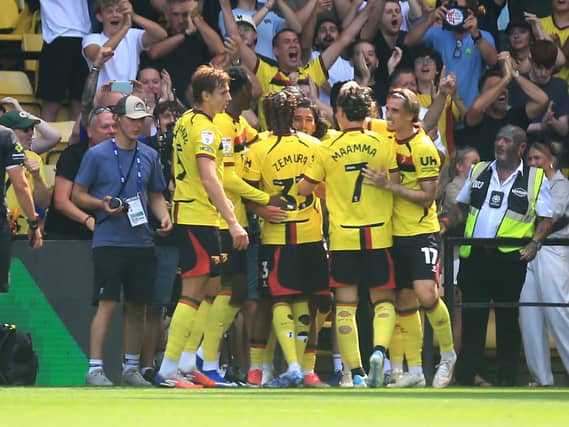 Watford’s Amin Nabizada (centre, facing) celebrates scoring