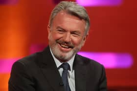 Sam Neill smiling on The Graham Norton Show