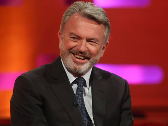 Sam Neill smiling on The Graham Norton Show