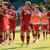 Aune Heggebo, centre, has been hit with a two-match ban for a charge of successfully deceiving officials to score a goal.