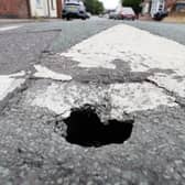 Pictures of the sinkhole that has opened up between Griffin Close and the Cannock Road on the Ironstone Road in Burntwood.