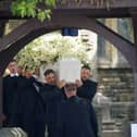 The coffin is taken from Swansea Minster