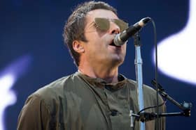 Liam Gallagher performing on stage during the Isle of Wight festival