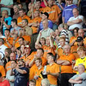 John Bray in the middle of a packed out away end at Deepdale