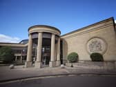 Exterior view of the High Court Glasgow under blue skies