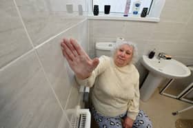 She is not happy with the work done by contractors. 
