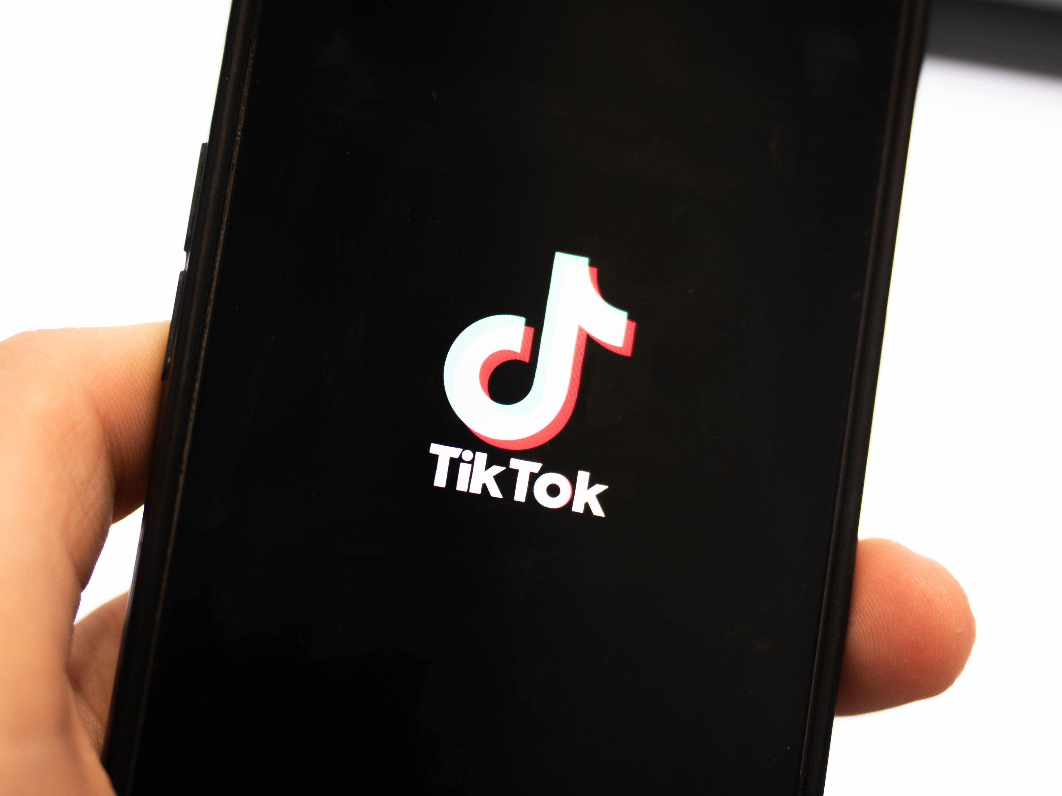 TikTok logo on a phone
