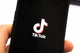 TikTok logo on a phone