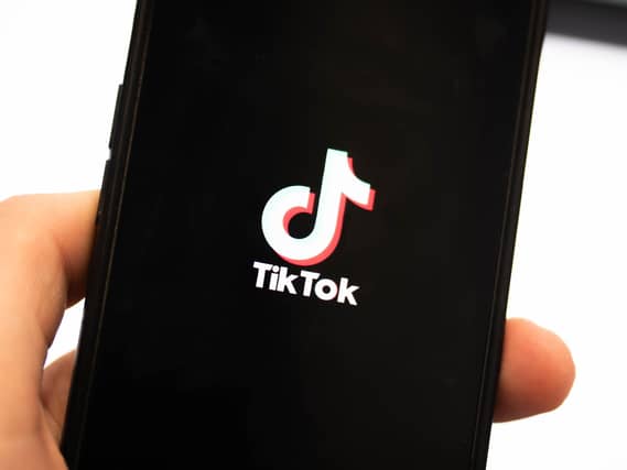 TikTok logo on a phone