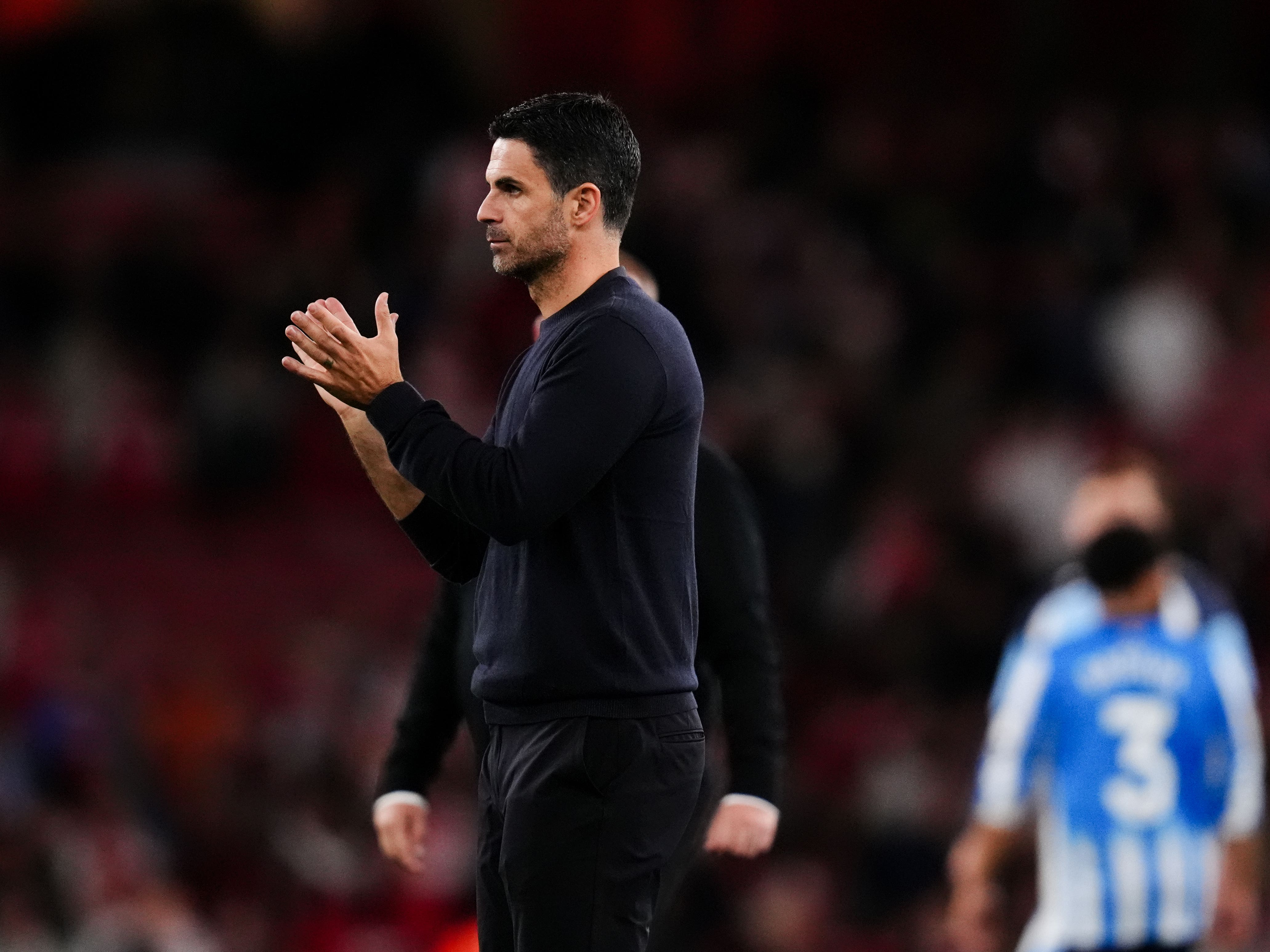 Mikel Arteta applauds the Arsenal fans after victory over Coventry
