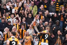 Hull’s Semi Ajayi, centre, celebrates his opening goal with Oli McBurnie in front of the home fans