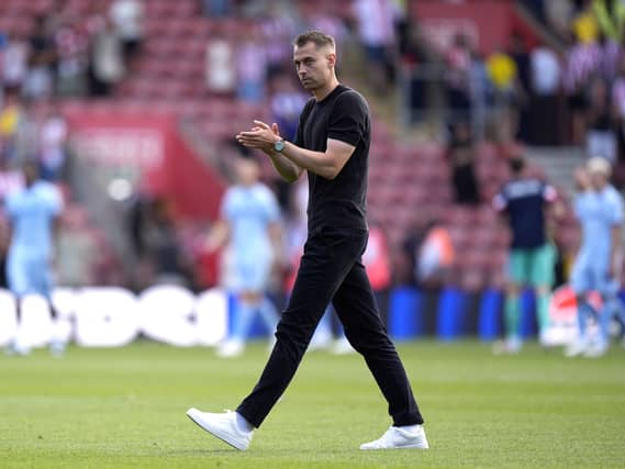 Southampton manager Tonda Eckert applauds