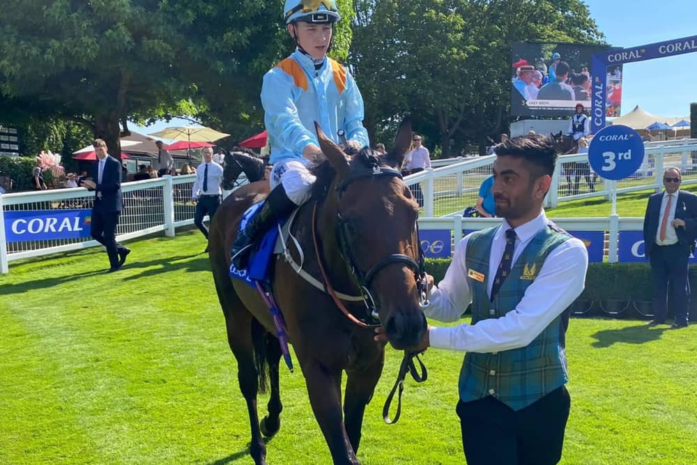 Lazy Griff and Billy Loughnane after winning the Coral Marathon at Sandown