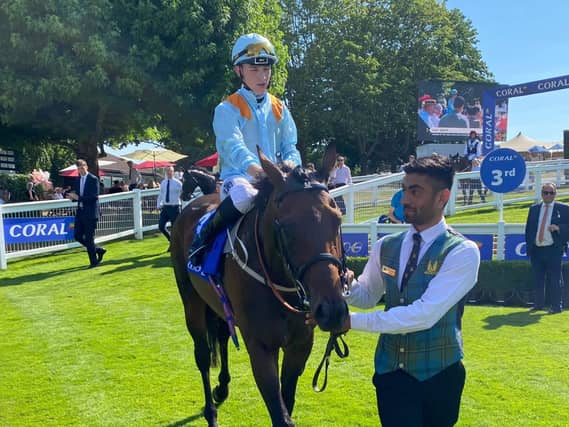 Lazy Griff and Billy Loughnane after winning the Coral Marathon at Sandown