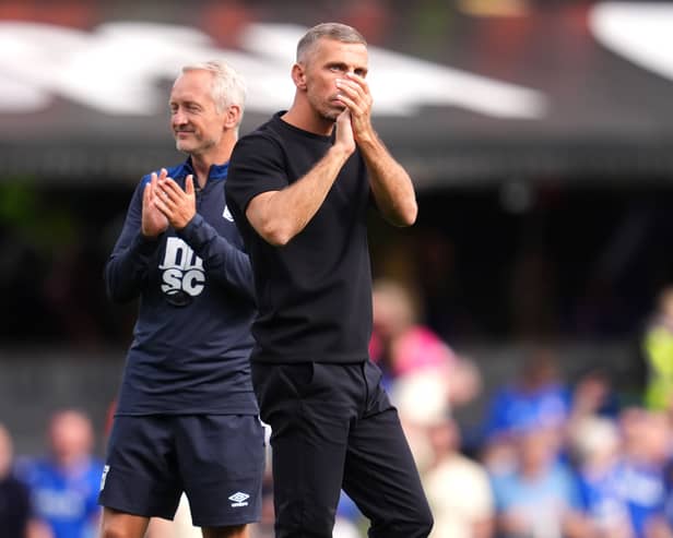 Ipswich Town manager Gary O’Neil (right) applauds the fans following victory against Sunderland