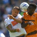 Preston North End's Harry Clarke battles with  Wolves’ Marshall Munetsi.