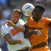 Preston North End's Harry Clarke battles with  Wolves’ Marshall Munetsi.