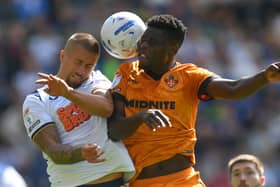 Preston North End's Harry Clarke battles with  Wolves’ Marshall Munetsi.