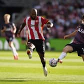 Archie Gray (right) competes with Brentford's Igor Thiago.