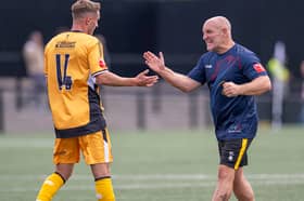 Rushall Olympic boss Ian Long (right) celebrates the win