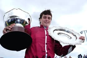 Daniel King with the Galway Plate and Hurdle trophies