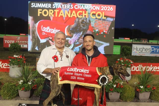 Joint-owner Gary Armstong and trainer Kelly Wilton's partner Sam Watson with Summer Stayers Classic champion Fortanach Col