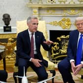 Canadian Prime Minister Mark Carney and US President Donald Trump meet in the White House in 2025
