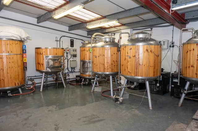 The brewery uses restored Grundy Teddington cellar storage tanks. Photo: Steph Geary Photography