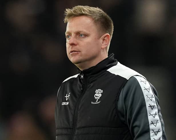 Lincoln boss Tom Shaw on the touchline