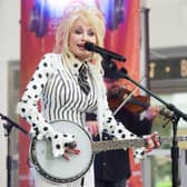 Dolly Parton playing the banjo