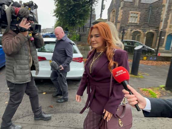 Anne Donaghy walking outside court