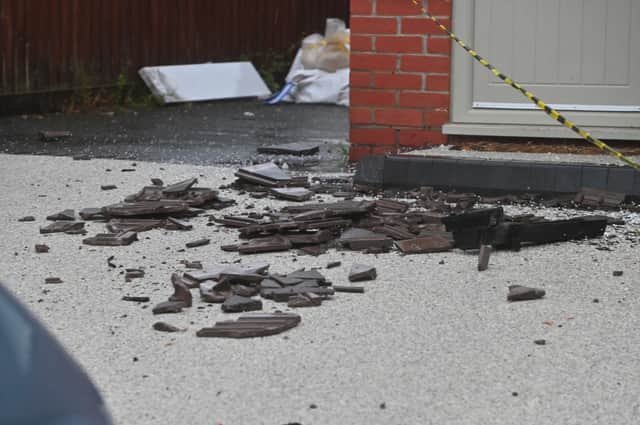 Debris from tiles removed by the fire service.