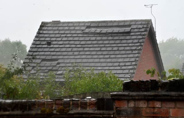 Tiles were also removed at the rear of the property.